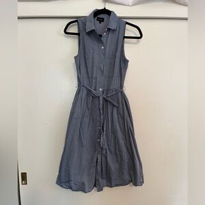 Chambray shirt dress ! This is a very light comfortable summer dress .
